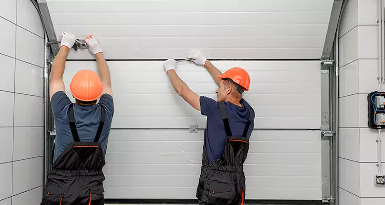 Garage Door Bottom Panel Repair in Casselberry, FL